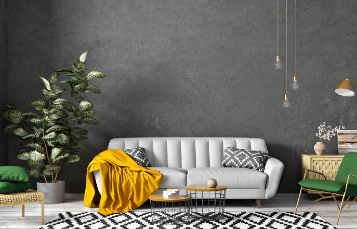 Gray sofa -concrete wall